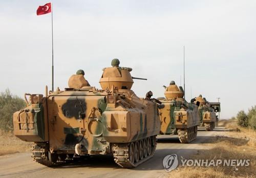 시리아 만비즈로 이동하는 터키군 [AFP=연합뉴스]