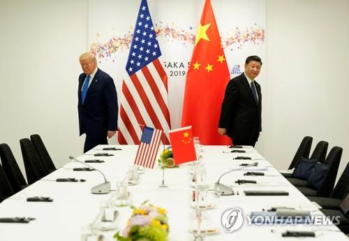 작년 7월 오사카 회담 당시 트럼프 대통령과 시진핑 주석 [로이터=연합뉴스 자료사진]