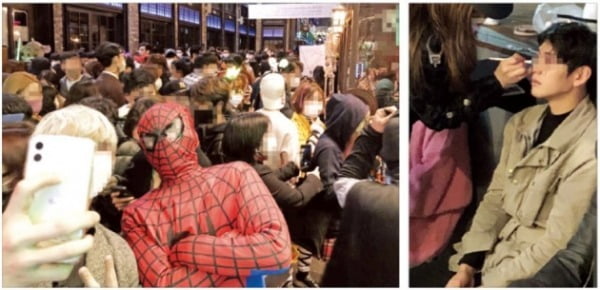 < 이태원 ‘방역 프리덤’? > 핼러윈데이인 지난달 31일 오후 11시께 서울 이태원 거리가 인파로 꽉 차 있다. 오른쪽은 이태원 거리에서 한 남성이 마스크를 벗고 페이스페인팅을 받고 있는 모습.  양길성 기자