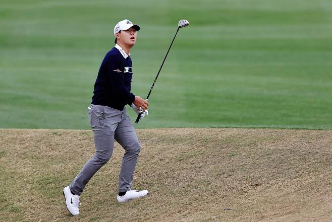 <YONHAP PHOTO-2086> LA QUINTA, CALIFORNIA - JANUARY 23: Si Woo Kim of South Korea plays a shot out of the bunker on the eighth hole during the third round of The American Express tournament on the Stadium course at PGA West on January 23, 2021 in La Quinta, California.   Sean M. Haffey/Getty Images/AFP == FOR NEWSPAPERS, INTERNET, TELCOS & TELEVISION USE ONLY ==/2021-01-24 07:10:21/ <저작권자 ⓒ 1980-2021 ㈜연합뉴스. 무단 전재 재배포 금지.>