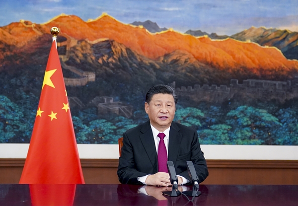 시진핑 중국 국가주석이 지난 25일 수도 베이징에서 세계경제포럼(WEF)이 개최한 '다보스 어젠다'에 화상으로 참여해 연설하고 있다. 신화통신 연합뉴스