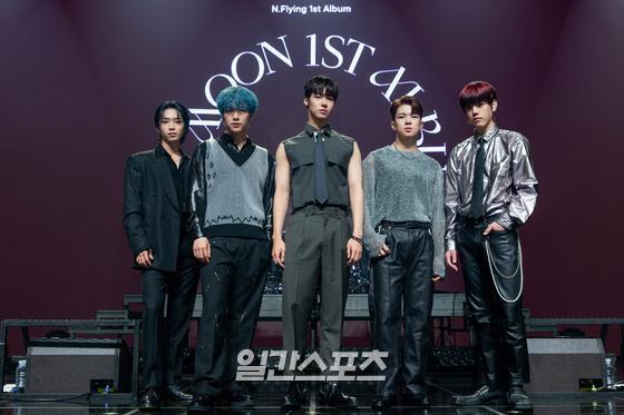 Group N.Flying poses for the first full-length album Man of the Moon show Case, which was held online on the afternoon of the 7th.Photo: FNC Entertainment Offers 2021.06.07