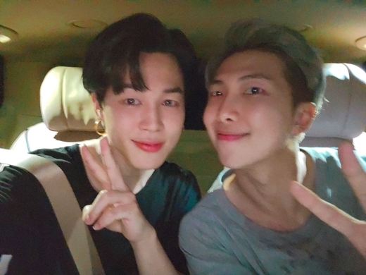 Group BTS members Jimin and RM released a friendly two-shot.On the 24th, BTS official Twitter Inc. posted a picture and an article with Jimin and RM.I am late for you, and I am in the top spot for four consecutive weeks on the Billboard, he said. I want to be loved so much.I love you sincerely, Ami (BTS fandom name) people with a thrilling message.BTS has been the number one digital single Butter released on the 21st of last month, and it has been the number one spot on the US Billboard Hot 100 chart for four consecutive weeks.The two posted photos to express their gratitude to their fans.Jimin and RM stare at the camera with a bright smile in the car, a warm friendship revealed in the image of the two men shyly drawing V and facing each other close.Especially comfortable attire is Jimin and RM, which boast flawless skin and bright visuals.The netizen who saw this responded such as Our minimony is so cute, You can get great love! Ami is the most visible in the BTS world.