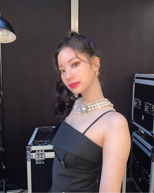 Group TWICE member Dahyun reveals unrealistic beautiful looksOn the 2nd, TWICE official Instagram posted a number of photos of Dahyun.In the open photo, Dahyun is wearing a black long dress and taking pictures in various compositions.Dahyun showed off her neat yet elegant charm in a costume with shoulder and arm lines, with a colorful Pearl necklace that overlays four lines adding to her charm.Especially, Dahyun is famous for its skin white, so it boasts cleanness with transparent skin.On the other hand, TWICE, which Dahyun belongs to, released its tenth mini album Taste of Love on November 11 and is actively performing with its title song Alcohol - Free.