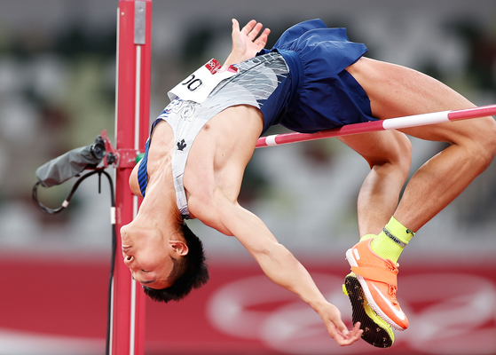 Woo Sang-hyeok competes during the men's high jump final at the Tokyo 2020 Olympic Games in Tokyo, Japan on Sunday. [XINHUA/YONHAP]