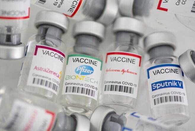 Pfizer and Moderna announced that their COVID-19 vaccines lose effectiveness over time. Vials of various COVID-19 vaccines are shown here. (Yonhap News)