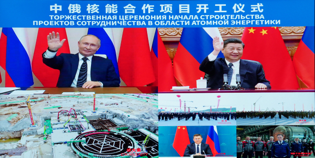 블라디미르 푸틴(사진 왼쪽 위) 러시아 대통령과 시진핑 중국 국가주석(사진 오른쪽 위)이 지난 5월 열린 중국 톈완·쉬다바오 원전 착공식 당시 열린 화상 회의에 참석하고 있다. /신화연합뉴스
