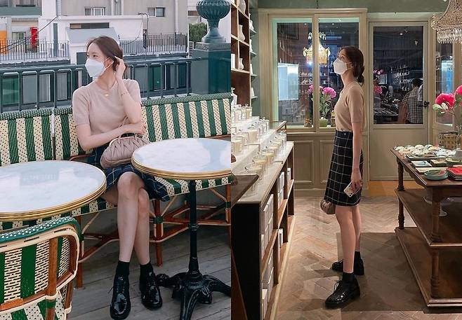 Girls Generation and actor Im Yoon-ah has emanated an Elegance charm.On the 22nd, Im Yoon-ah posted several photos on his Instagram with an article entitled Feels like Im back in Paris.Im Yoon-ah in the photo showed an Elegance charm by matching a check skirt with a beige tone short-sleeved knit.A bundle of hair that revealed a pretty forehead and a slender neckline revealed a pure deer beauty.Im Yoon-ah attracted attention with Goddess visuals and a delicate figure that was not covered even with a mask.Fans praised it with comments such as Its so beautiful, Full Goddess and Cute.On the other hand, Im Yoon-ah is meeting with the audience with the movie Miracle released on the 15th.