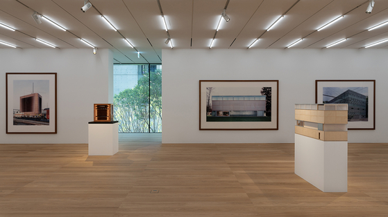 Photographs by the famous German artist Thomas Ruff of buildings designed by Herzog & de Meuron around the world with the building's models on view at the new SongEun museum building [SONGEUN]