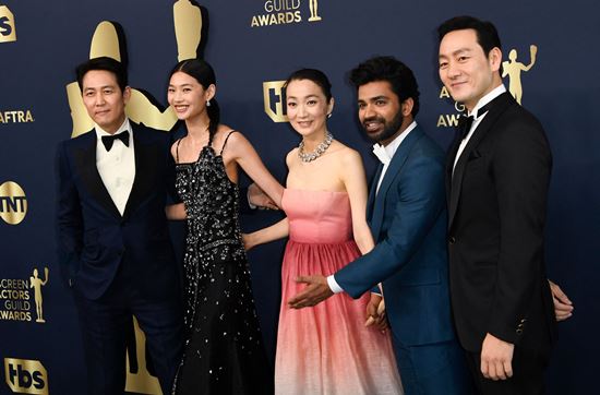 The main characters of the Netflix original series Squid Game (director Hwang Dong-hyuk) brilliantly shone the United States of America Actor Guild Award (SAG) awards ceremony.At the 28th SAG Awards held in United States of America LA on the 27th (local time), Squid Game was nominated for four categories, including the Best Ensemble Award in the Drama category, the Stunt Ensemble Award, the Lee Jung-jae Award, and the Best Actress Award (HoYeon Jung) in three categories, excluding the Ensemble Award. The award was a triumph.In particular, Lee Jung-jae and HoYeon Jung were meaningful because they were awarded by Korea Actors for the third consecutive year.In 2020, the cast of Bong Joon-hos parasite won the Ensemble Award in the film category. Last year, Yoon Jung-jung won the Best Supporting Actress Award for the movie Minari.Even if the range is expanded to non-English-speaking actors, it is still the first result, and foreign media have commented on their awards.Lee Jung-jae, who won the Best Actor award for Best Actor, said: Oh my God, thank you so much.This is too big for me. He said, Ive been writing a lot, but I can not read it. Thank you so much.Thank you to SAG and the audience around the world for loving Squid Game. Thank you so much for the Squid Game team. Asked if he had United States of America Actor, who he hoped to appear in season 2 of Squid Game in a red carpet interview before the awards ceremony, he mentioned Leonardo DiCaprio.First of all, thank you, said HoYeon Jung, who won the FoxMain actor award.I watched many Actor here on TV as an audience, I watched them on screen, and I always dreamed that I wanted to be an Actor, and I am truly honored and really grateful to be here now. Thank you for letting me dream of Actor.And thank you for opening the door to me. After expressing his feelings in English, he added thanks to director Hwang Dong-hyuk, producer Kim Ji-yeon Cylon Pictures, and the cast of Squid Game .When the news came out, Lee Byung-hun, HoYeon Jungs lover Lee Dong-hwi and Lee Jung-jaes best friend Jung Woo-sung delivered a message of congratulations through Instagram.Jessica Chastain, who was at the scene, was caught on relay cameras showing tears after HoYeon Jungs award testimony, while Sandra O of Killing Eve, a Korean-American United States of America actor, and Greta Lee of Like a Russian Doll celebrated their place during the interim ad time.In particular, Greta Lee was encouraged to cry in HoYeon Jung, who is crying, in Korean, Do not cry, do not cry.After the awards ceremony, Kim Joo-ryong celebrated the day by uploading a photo taken with Sandra O, and foreign media also took a commemorative photo with Lady Gaga, who sat next to him.Also, the styling that HoYeon Jung showed on this day received much attention.He was fascinated by his desire to put the traditional elements of Korea into Louis Vuitton, where he is a global ambassador, and Louis Vuitton was very popular in Korea with his dinghy head.Photo: AFP/Union News, SAG Official Instagram, Jenny Joe Instagram