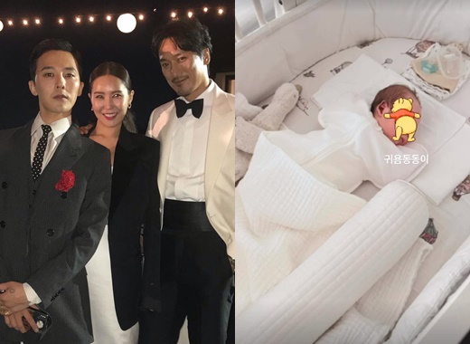 The nephew of the group Big Bang leader G Dragon was released in surprise.G-Dragon sister Kwon Dami posted a picture of her son Eden for the first time with the message Guillaume Dong-dong on her instagram on the 1st.The photo shows Eden, who is 26 days old, lying down with a cute figure.In addition, Kwon Dami said, We are Eden who is well adapted to come home. He added, We have already surpassed 4.5kg on the 26th day of birth.Actor Um Tae-woongs wife Yoon Hye-jin wrote a comment saying .Kwon Da-mi married actor Kim Min-joon in 2019, and he won on the 4th of last month.