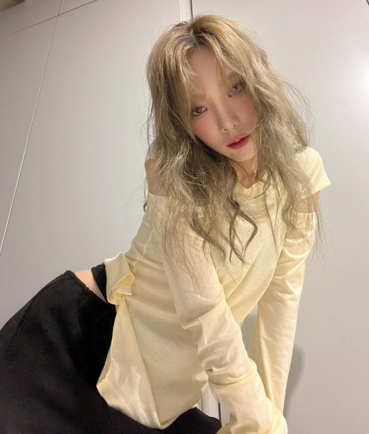 Taeyeon (real name Kim Taeyeon and 33) of the group Girls Generation attracted attention with recent photos.On the 17th, Taeyeon posted several photos through his instagram.Taeyeon, who has a dreamy atmosphere with her bright hair tangled, is staring at the camera with her chic eyes. Her flawless beauty and ceramic skin catch her eye.Especially, the costume with the open shoulder and waist is impressive. It is a slim body and a unique costume that has hip and caused the fans hot reaction.Meanwhile, Taeyeon released her third solo album, INVU last month, and she is active in various entertainments such as cable channel tvN Amazing Saturday and Mnet Queendom 2.