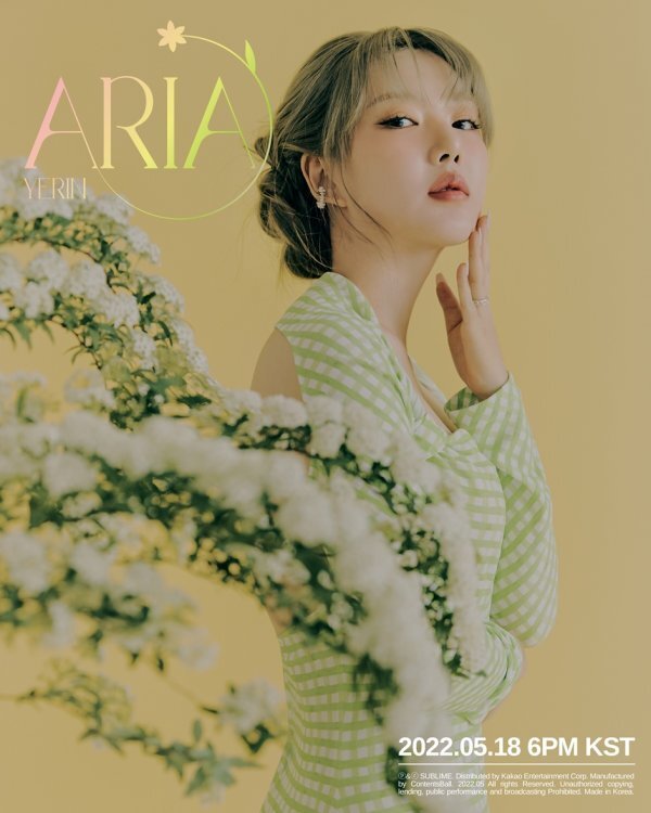 Yerin, a group from GFriend, unveiled the concept photo ahead of Solo debut.First, Yerin in the first concept photo produced an elegant yet neat mood, with a green tone check-based dress and sophisticated styling.In the photo, Yerin gave a point with a white chiffon dress and colorful flower parts that show clear and clean image among colorful flowers.He showed a more mature appearance with dreamy eyes and fascinating poses.Yerins first Mini album ARIA will be released on various online music sites at 6 pm on the 18th.