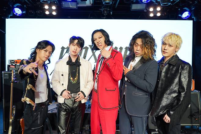 Band CraXilver poses for photos during a press showcase event held in Seoul, Tuesday. (Oui Entertainment)