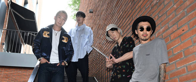 Legendary punk rock band No Brain poses for photos during an interview with The Korea Herald at The Korea Herald’s headquarters in Seoul, on Friday. (Im Se-jun/The Korea Herald)