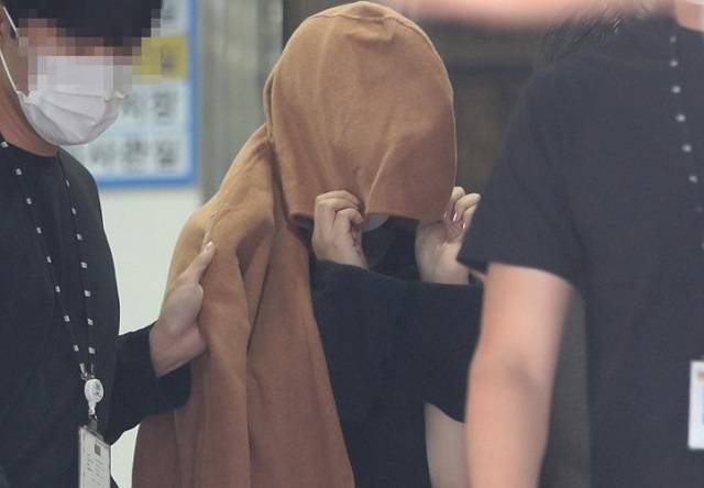 뉴질랜드 '가방 속 아이 시신' 용의자. 연합뉴스