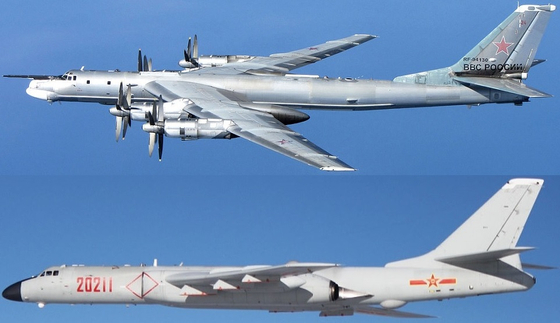 Russia’s Tu-95 strategic bomber, top, and China’s H-6 bomber, above. [JOONGANG ILBO]