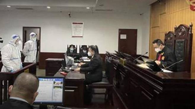 중국의 방역 규정 위반 사범 재판 모습 (사진=건강시보 캡처, 연합뉴스)