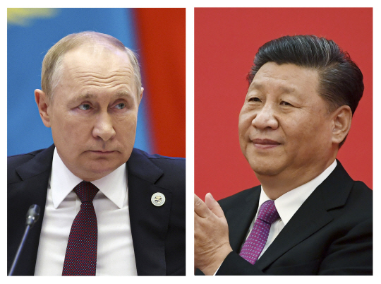 오는 20일 러시아 모스크바에서 정상회담을 갖는 블라디미르 푸틴(왼쪽) 러시아 대통령과 시진핑 중국 국가주석. AP 연합뉴스