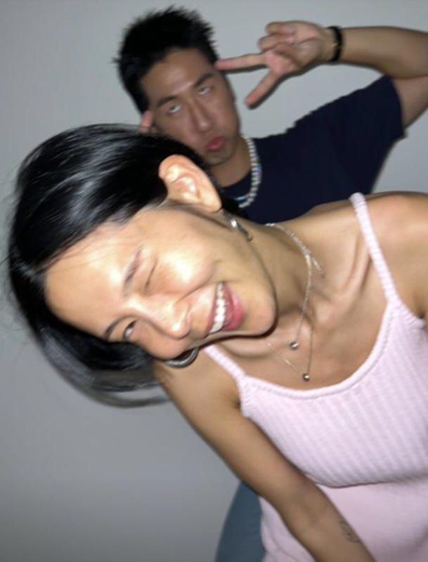 Broadcaster Kim Na-young has released photos of the couple with MY Q.On the 14th, Kim Na-young took a playful two-shot with MY Q with a wink that seemed happy in the world.Kim Na-young, who looks more healthy with a tanned tan, emits a cute wink with a cute wink, and her boyfriend MY Q has a humorous look behind her.The two men in public love show Tikitaka together and show off their 10-year-old couple.Meanwhile, Kim Na-young admitted to a public romance with singer and artist MY Q in 2021.