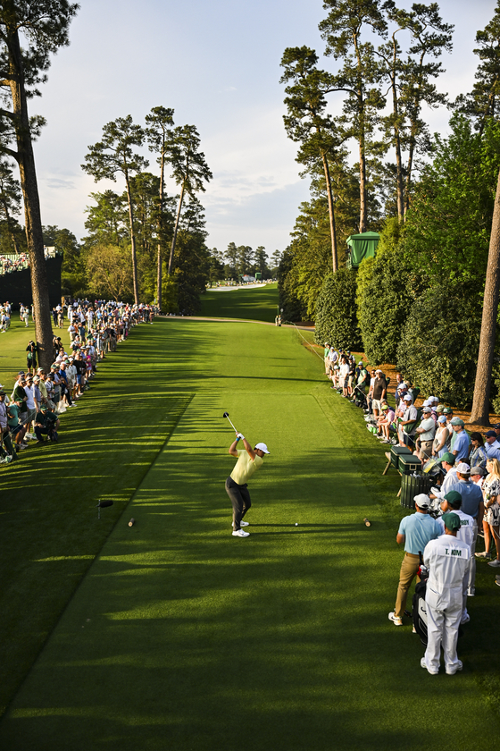 Tom Kim plays his shot from the 18th tee during the first round of the 2023 Masters Tournament at Augusta National Golf Club in Augusta, Georgia on April 6, 2023.  [GETTY IMAGES]