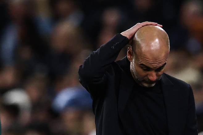Manchester City's Spanish manager Pep Guardiola reacts during the UEFA Champions League quarter-final second-leg football match between Manchester City and Real Madrid, at the Etihad Stadium, in Manchester, north-west England, on April 17, 2024. (Photo by Darren Staples / AFP)







<저작권자(c) 연합뉴스, 무단 전재-재배포, AI 학습 및 활용 금지>