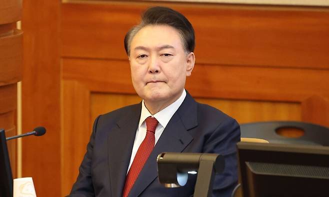 윤석열 대통령이 지난 2월 13일 서울 종로구 헌법재판소에서 열린 탄핵심판 8차 변론에 출석해 있다. 뉴스1