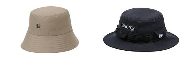(왼쪽부터) 고어텍스 소재가 적용된 코오롱스포츠의 ‘고어텍스 버킷햇’,
뉴에라의 ‘아웃도어 고어텍스 리플렉티브 로고 어드벤처 버킷햇’.