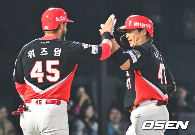 위즈덤과 나성범./OSEN DB