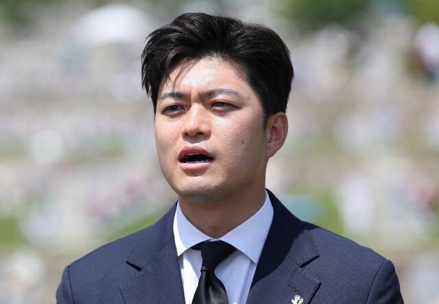 김용태 국민의힘 비상대책위원장이 6일 서울 동작구 국립서울현충원에서 취재진 질문에 답하고 있다. 연합뉴스