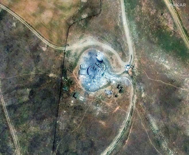 미국 위성업체 맥사 태크놀로지가 지난 16일 촬영한 이란 피란샤르 핵시설. 이스라엘 공습으로 지상 시설이 파괴되어 있다. 로이터연합뉴스
