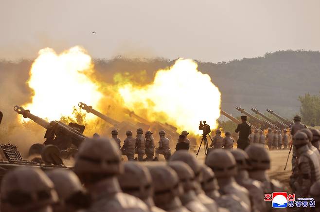 A firing contest among artillery subunits of large combined units of the Korean People's Army, inspected by North Korean leader Kim Jong-un, is conducted at an unspecified location on May 29, 2025, in this photo released by the North's official Korean Central News Agency the next day. (Yonhap)