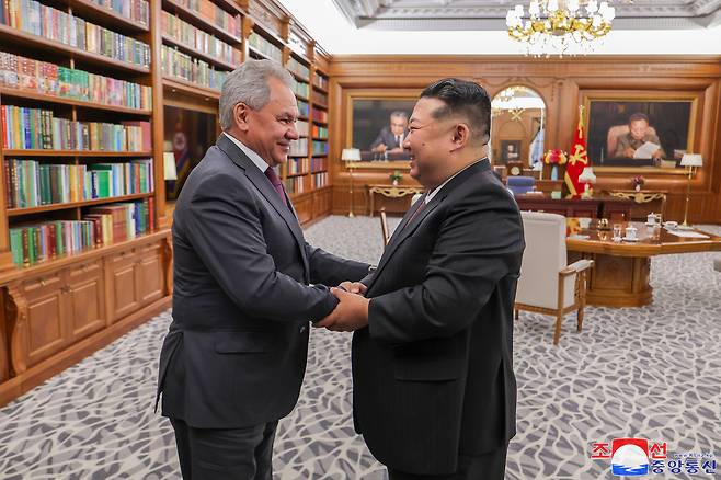 North Korean leader Kim Jong-un (right) meets with Russia's Security Council Secretary Sergei Shoigu in Pyongyang on June 4, 2025, in this photo released by the North's official Korean Central News Agency the next day. The two sides discussed cooperation in various fields and exchanged views on the situation surrounding the Ukrainian crisis and the Korean Peninsula. (Yonhap)