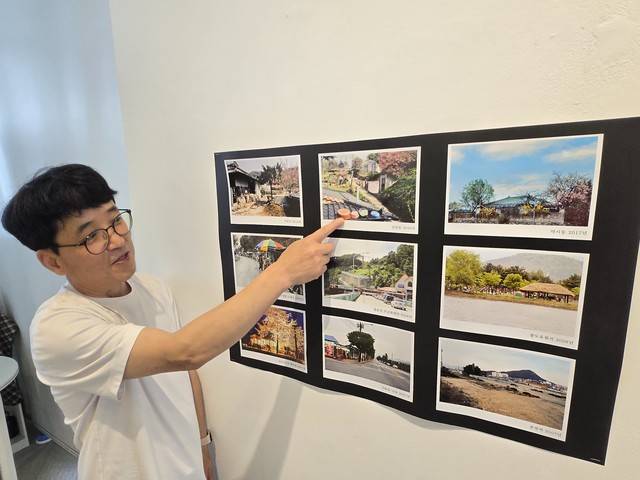 ▲ 전시 현장에서 만난 이수환 사진가가 사라진 춘천의 풍경에 대해 설명하고 있다.