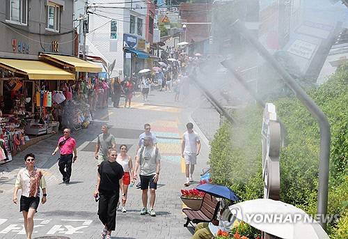 더위 식히는 쿨링 포그. 연합뉴스