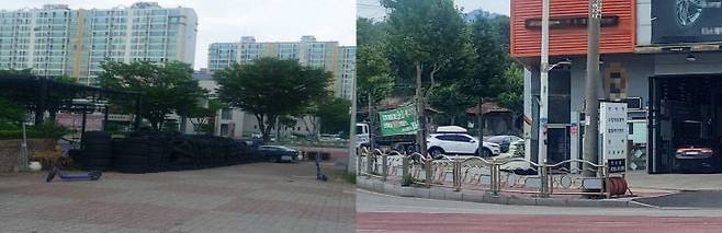 타이어 전문점 옆 골목길에 적치된 타이어와 인도 위 무단 철제 입간판, 가로수 현수막 게시 사진.