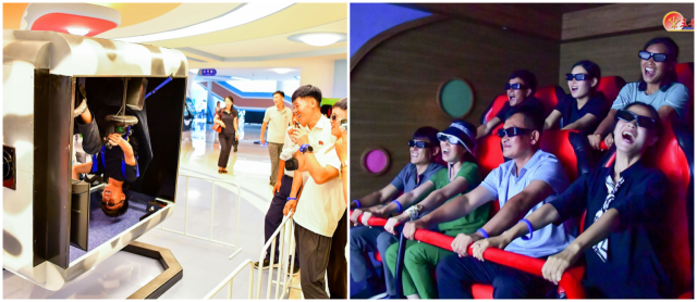 4D 오락기기를 즐기는 관광객(왼쪽 사진)을 구경꾼들이 스마트폰으로 촬영하고 있다. 3D 콘텐츠를 즐기는 듯한 이들의 사진도 공개됐다. 노동신문·뉴스1