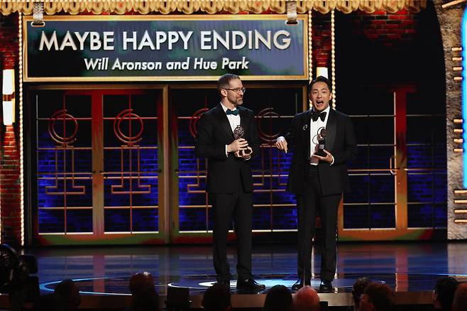 Will Aronson (left) and Hue Park accept the best score award for "Maybe Happy Ending" at the 78th Annual Tony Awards pre-show in New York City, on Sunday. (Reuters-Yonhap)