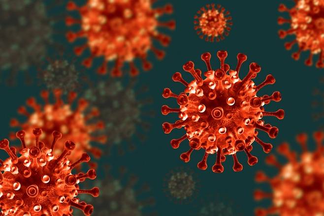 신종 코로나바이러스 감염증(COVID-19·코로나19) 팬데믹이 바이러스에 감염되지 않은 사람들에게도 뇌 노화를 촉진했을 수 있다는 연구 결과가 제시됐다. 코로나19 바이러스를 표현한 이미지. 게티이미지뱅크 제공.