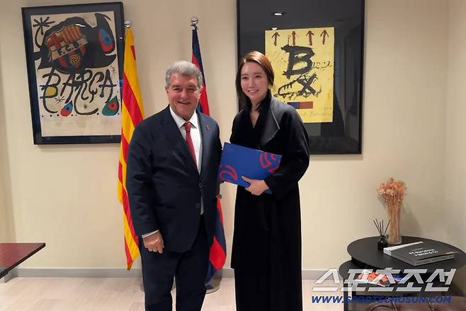 라포르타 바르셀로나 회장과 함슬 디드라이브 대표