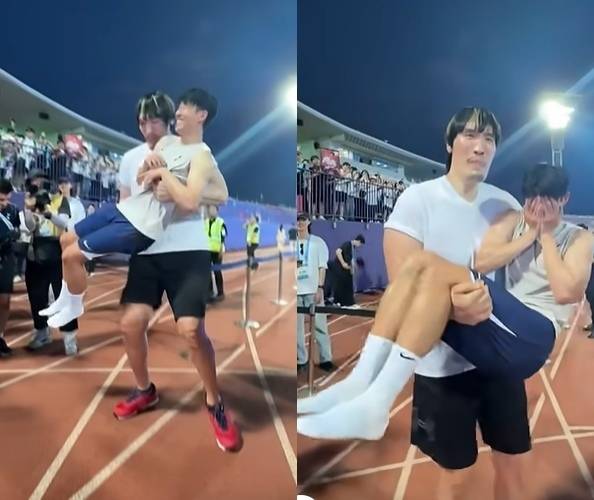 격투기 선수 최홍만(왼쪽)이 2일 경기 안양시 안양종합운동장에서 열린 잉글랜드 프리미어리그(PL) 토트넘 홋스퍼의 공개 훈련 현장을 찾아 손흥민을 두 팔로 번쩍 들어올렸다. 손흥민은 웃음을 감추지 못한 채 두 손으로 얼굴을 감쌌다. 자료 : 토트넘 홋스퍼 인스타그램