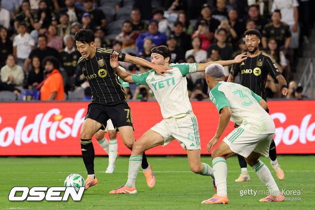 LOS ANGELES, CALIFORNIA - OCTOBER 29: Son Heung-Min #7 of LAFC controls the ball against Ilie Sánchez #6 of Austin FC during the first half of their 2025 MLS Cup Playoffs game at BMO Stadium on October 29, 2025 in Los Angeles, California.  (Photo by Kevork Djansezian/Getty Images)