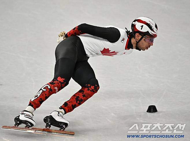 15일(한국시간) 이탈리아 밀라노 아이스스케이팅 아레나에서 쇼트트랙 남자 1500m 예선이 열렸다. 힘차게 질주하는 캐나다 단지누. 밀라노(이탈리아)=송정헌 기자songs@sportschosun.com/2026.02.15/