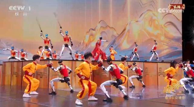 16일 방영된 중국중앙방송(CCTV) 춘제 갈라쇼 '춘완'에 유니트리의 휴머노이드 로봇들이 허난성 타거우무술학교의 학생들과 무술 공연을 펼치고 있다. CCTV 캡처