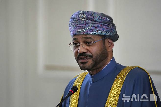 Omani Foreign Minister Sayyid Badr Albusaidi speaks in a joint press briefing with his Iranian counterpart Abbas Araghchi after their meeting in Tehran, Iran, Monday, Dec. 30, 2024. (AP Photo/Vahid Salemi)