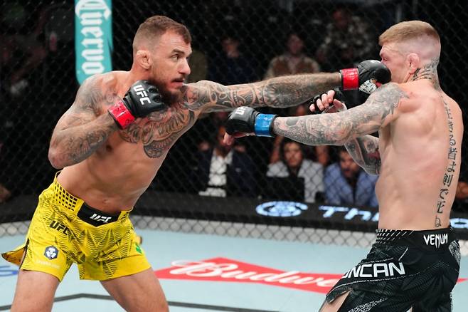 헤나토 모이카노(왼쪽)와 크리스 던컨. 사진=UFC