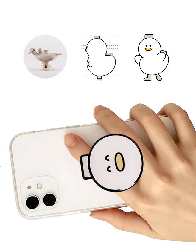 김해 망덕리 고분군에서 출토된 가야시대 오리 모양 토기(위)를 모티브로 한 캐릭터 토더기 . 김해시 제공