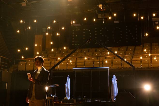 Danny Ahn performs in a scene from "At the Boundary of Light and Darkness." (Theater Soo)