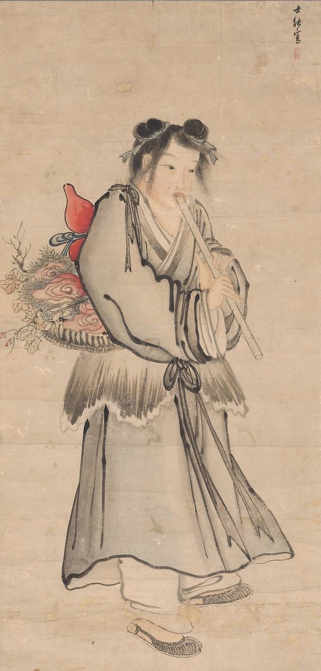 김홍도 '선동취적도(피리 부는 어린 신선)'(18세기). 피리를 부는 어린 신선을 그린 인물화다. 붉은 호리병을 메고 불로초가 담긴 바구니를 든 모습이 친근하다. /국립중앙박물관