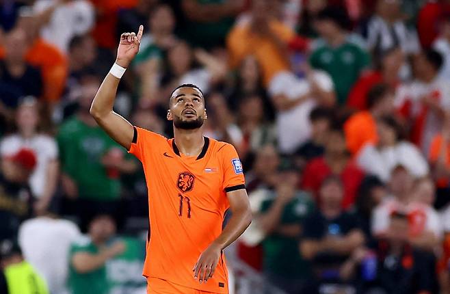 Soccer Football - FIFA World Cup 2026 - Round of 32 - Netherlands v Morocco - Estadio Monterrey, Monterrey, Mexico - June 29, 2026 Netherlands' Cody Gakpo celebrates scoring their first goal REUTERS/Eloisa Sanchez TPX IMAGES OF THE DAY<저작권자(c) 연합뉴스, 무단 전재-재배포, AI 학습 및 활용 금지>